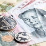 Renminbi pilotato al ribasso