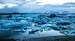 financialounge -  Baringa Partners BlackRock cambiamento climatico emissioni di carbonio Net Zero